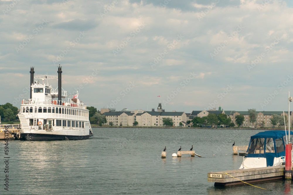 Tourist steamer in the evening on the pier