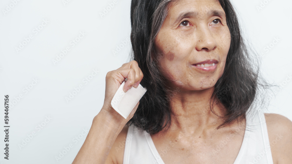 Close up older elderly asian chinese woman gray hair worry cancer worry about hair loss Close up older elderly asian chinese woman gray hair worry cancer worry about hair loss