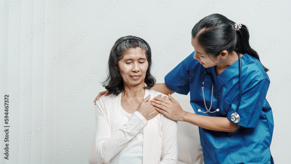 Senior older elderly patient asian grandmother woman with nurse consulting, safety and support of help, trust of breast cancer awareness, encourage Senior older elderly patient asian grandmother woman with nurse consulting, safety and support of help, trust of breast cancer awareness, encourage