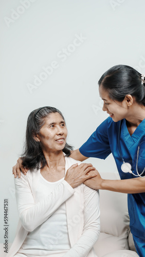 Senior older elderly patient asian grandmother woman with nurse consulting  safety and support of help  trust of breast cancer awareness  encourage