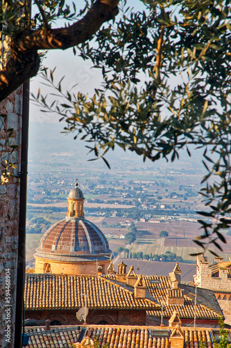Italy, Umbria, Assisi. The dome of the Convento Chiesa Nuova with the countryside in the distance. © Danita Delimont