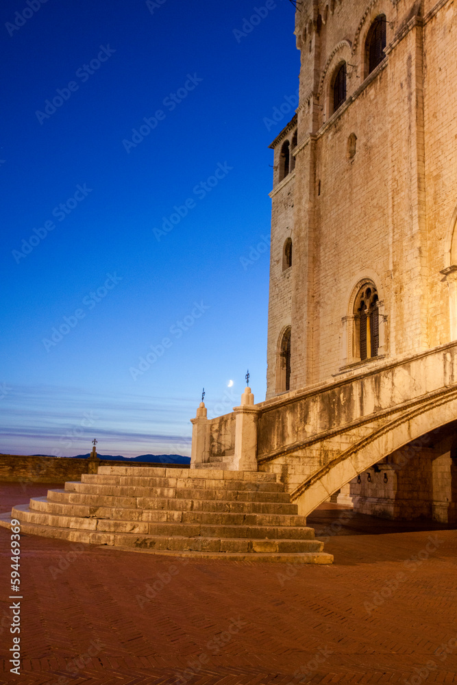Italy, Umbria, Gubbio. Stairs leading to the Palace of the Consuls in the Piazza Grande with evening light.