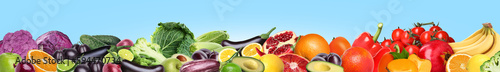 Fototapeta Naklejka Na Ścianę i Meble -  Many different fresh fruits and vegetables on light blue background. Banner design