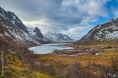 Norway, Lofoten Islands. Overlook into valley with Lake Storvatnet in the foreground and Mount Flakstadtind in the background