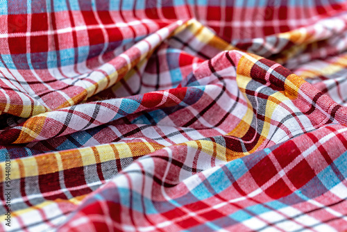 The grid pattern of the loincloth has a unique color.