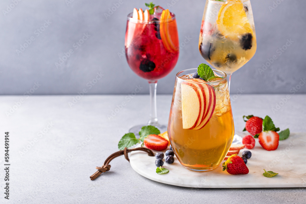 Refreshing summer berry sangrias with white and red wine
