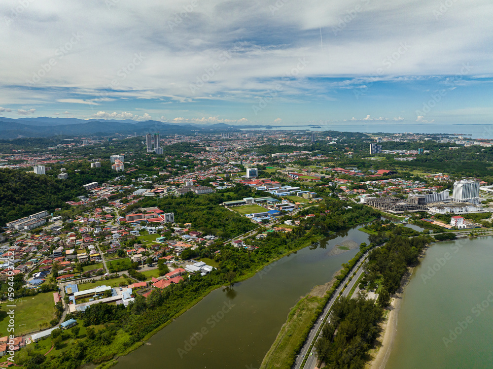 Aerial drone of panorama of Kota Kinabalu city with modern buildings. Borneo,Sabah, Malaysia.