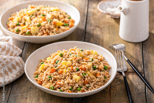 Pineapple fried rice with peas and carrots