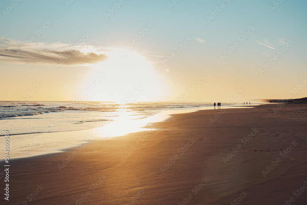 Long exposure of bright orange sunset over the tropical sea and sky with clouds. Beautiful sunset blue summer. Long exposure of bright orange sunset over the tropical sea and sky with clouds. Beautiful sunset blue summer.