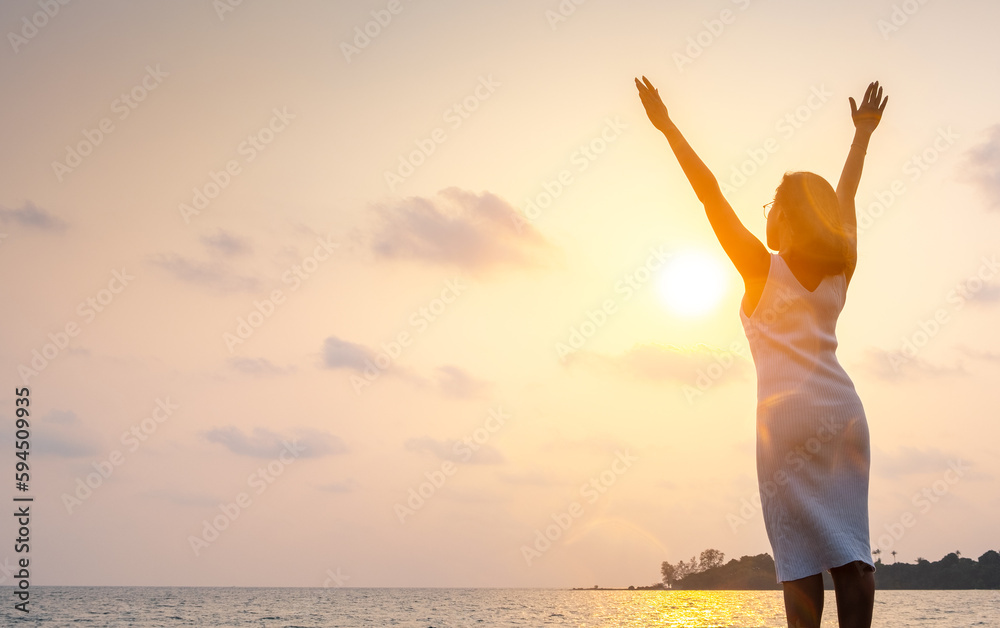 new morning woman lifting arms stretching welcome the morning sun health concept