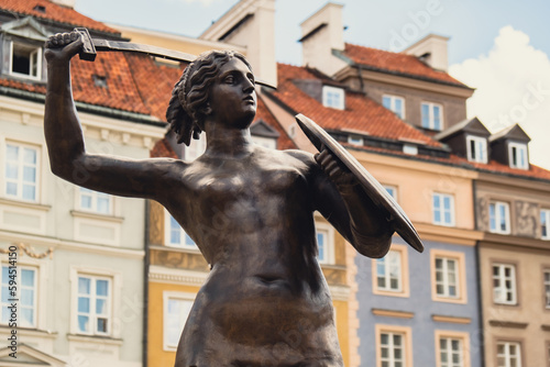 The Statue of Mermaid of Warsaw, Polish Syrenka Warzawska, symbol of Warsaw in the Old Town Market Square. Travel attraction tourist destination