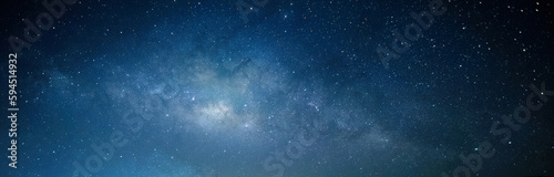 Space background with night starry sky and Milky Way. Dark blue nebula.