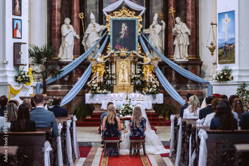 Wedding behind the scenes, children in the church © Stanislav