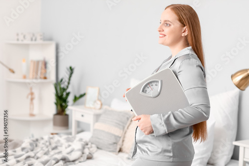 Young overweight woman with...