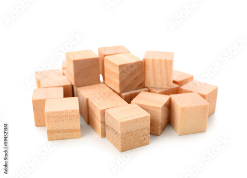 Heap of wooden cubes isolated on white background