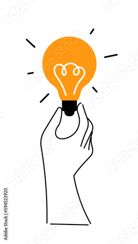 A hand holds a glowing lamp