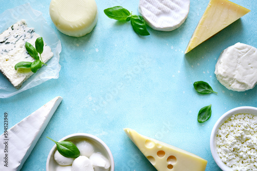 Food background with different types of cheese. Top view with copy space.