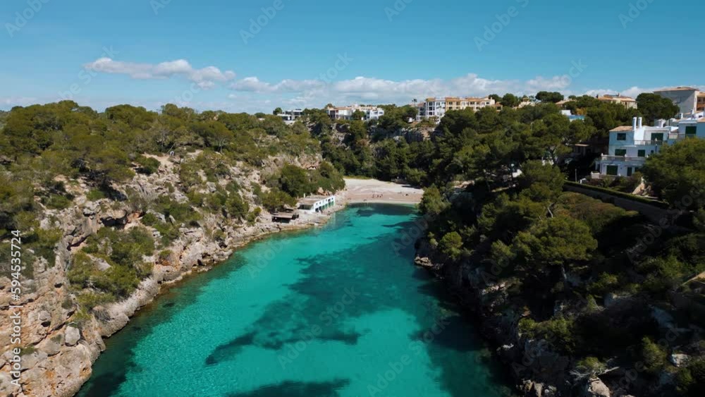 Cala Pi at Palma de Mallorca Island, natural idyllic turquoise blue clear sea water, sandy beach seaside cliff coast. Spanish Balearic Majorca, epic pristine cinematic tourist destination aerial drone Cala Pi at Palma de Mallorca Island, natural idyllic turquoise blue clear sea water, sandy beach seaside cliff coast. Spanish Balearic Majorca, epic pristine cinematic tourist destination aerial drone