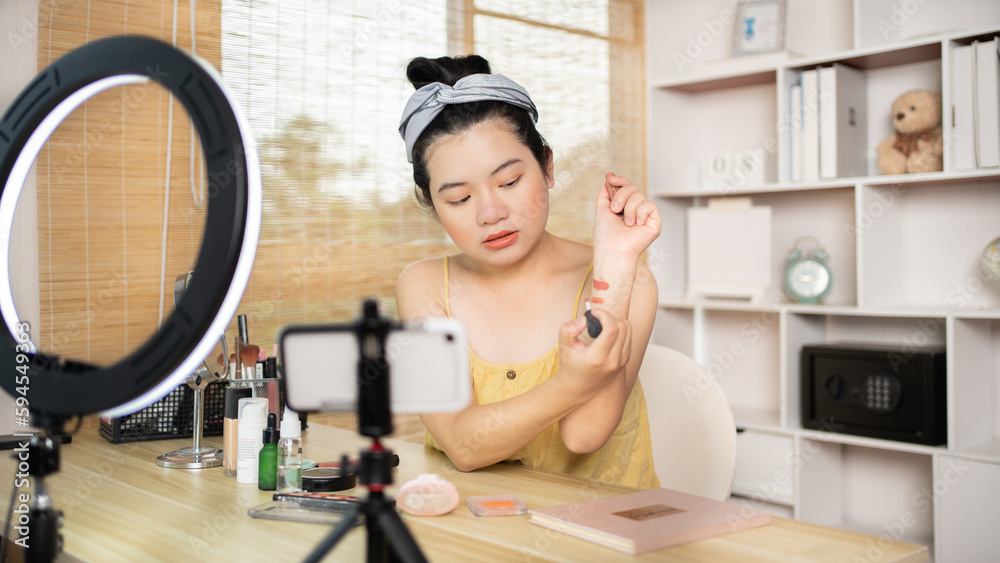 Beautiful women with social media influences recommend products and make-up accessories to be more beautiful, Recording vlog video live streaming, Online business of beauty bloggers. Beautiful women with social media influences recommend products and make-up accessories to be more beautiful, Recording vlog video live streaming, Online business of beauty bloggers.