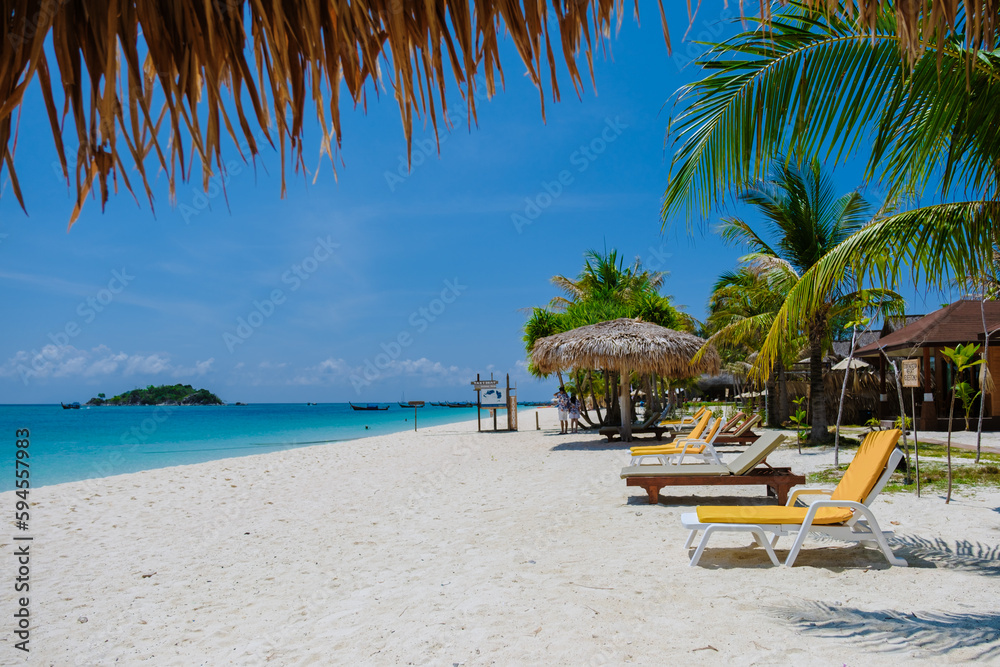 Koh Lipe Island Southern Thailand with turqouse colored ocean and white sandy beach at Ko Lipe