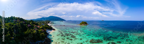 Koh Lipe Island Southern Thailand with turqouse colored ocean and white sandy beach at Ko Lipe