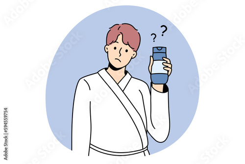 Cosmetics and treatments for men concept. Young man wearing bathtub standing cosmetic bottle in hands with question mark nearby vector illustration