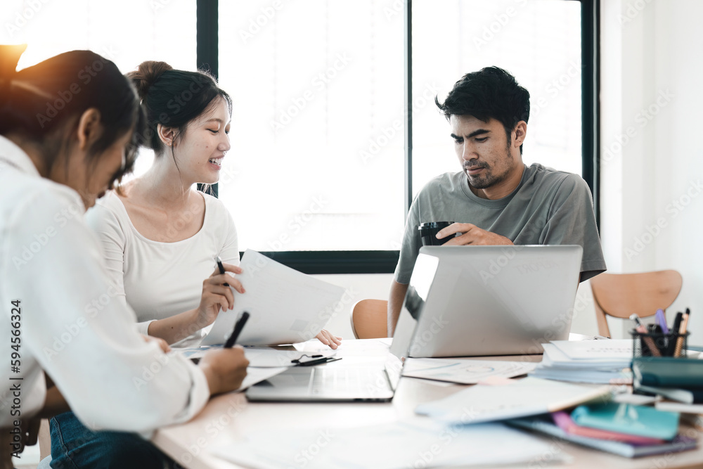 Diverse colleagues working on project together. Diverse Team of Creative Professionals Talk, Brainstorms Diverse colleagues working on project together. Diverse Team of Creative Professionals Talk, Brainstorms