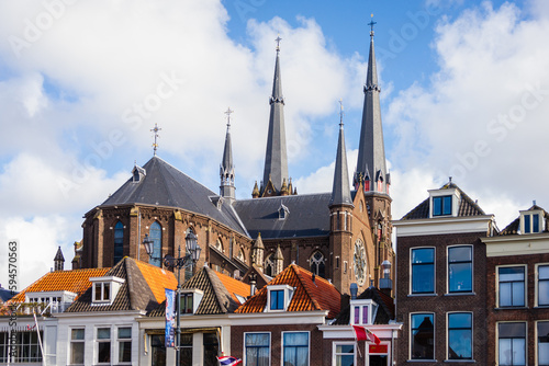 19 April 2023, Delft, Netherlands, architectural details of Maria van Jessekerk and surrounding buildings roofs