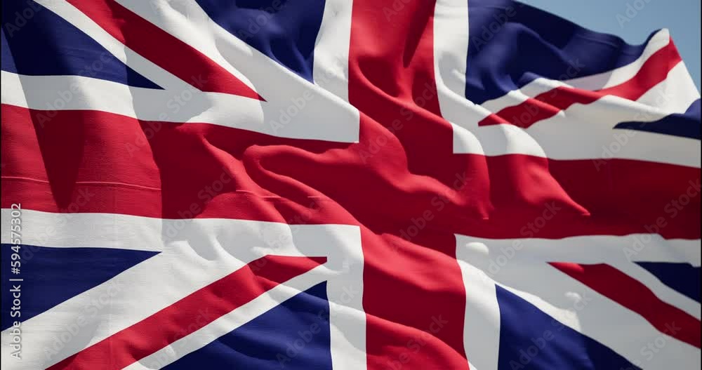 United Kingdom waving flag. UK British National closeup. Empire Banner Flaping in Wind