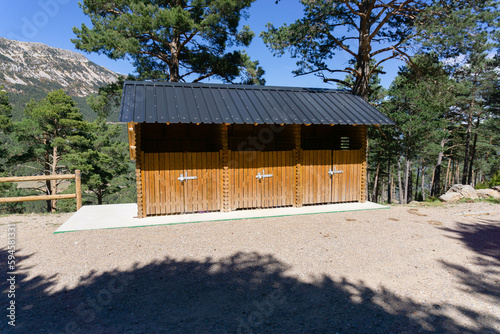 Wooden huts to store rubbish bins in a national park in the Catalan Pyrenees