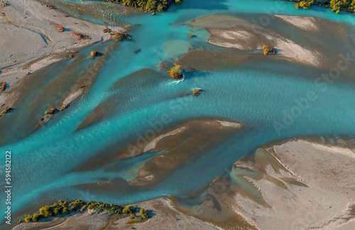 Bird's eye view of river braiding, Aoraki Mt Cook national park, New Zealand. Blue and turquoise water. Aerial drone shot.