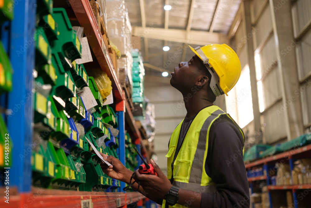 Group of Industrial workers working at a warehouse factory. Group of Industrial workers working at a warehouse factory.