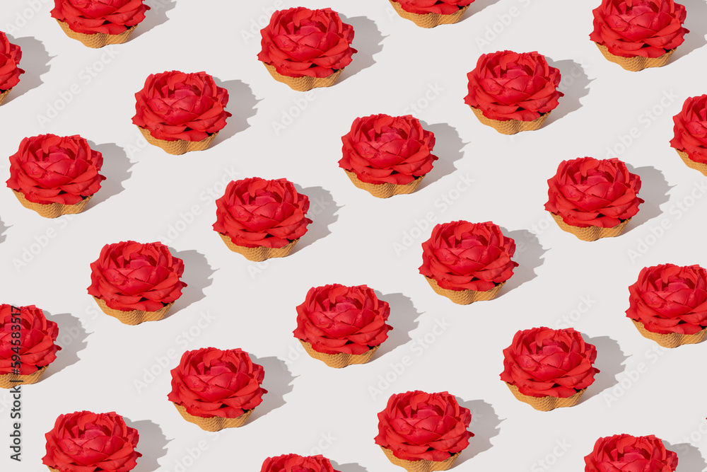 Isolated red rose in ice cream cone on white background. Minimal roses pattern. Isolated red rose in ice cream cone on white background. Minimal roses pattern.