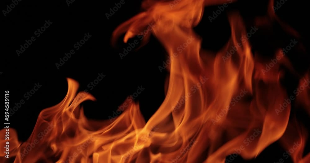 Flames of fire on black background in slow motion Flames of fire on black background in slow motion