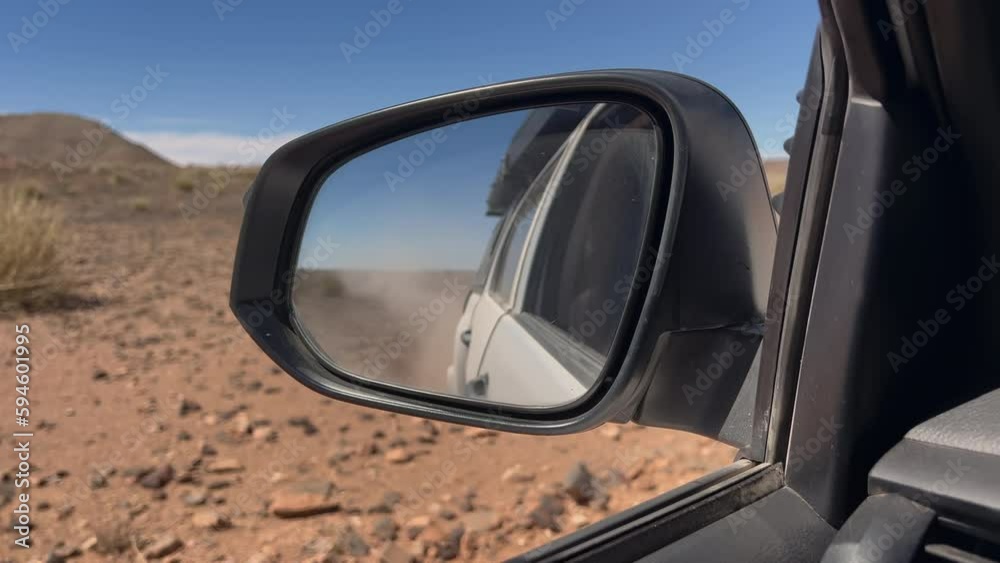 POV car driving on asphalt highway. Left side traffic. Savannah road in Africa. POV car driving on asphalt highway. Left side traffic. Savannah road in Africa.