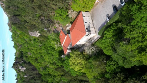 VERTICAL DRONE SHOT monastery of san pedro of rocas, esgos, ourense, spain, orbit green forest photo
