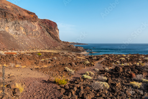 Volcanic path on the beach of Tacoron in El Hierro to go down to the recreational area, Canary Islands photo