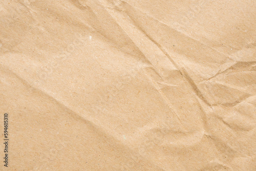 Abstract crumpled and creased recycle brown paper texture background
