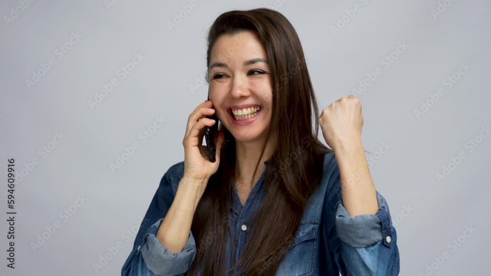 Portrait of happy woman enjoy success on mobile phone Portrait of happy woman enjoy success on mobile phone