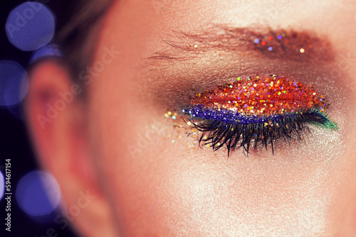 glitter on the eyelashes of the girl. the festive evening make-up