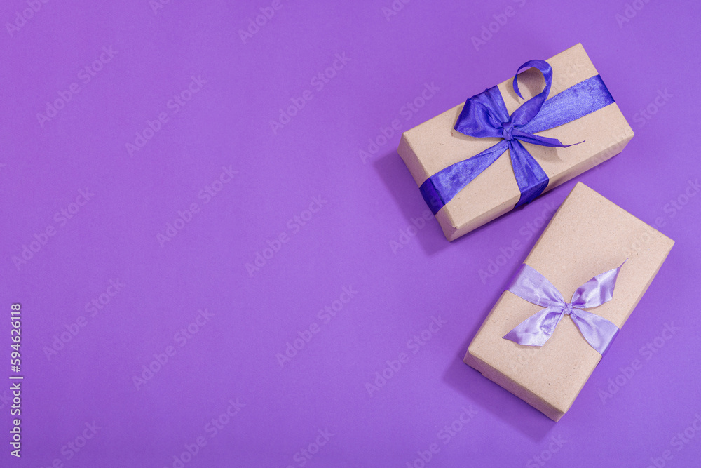 Zero waste gift concept. Bright roses, wrapped in paper surprise box for Anniversary, Mothers Day Zero waste gift concept. Bright roses, wrapped in paper surprise box for Anniversary, Mothers Day
