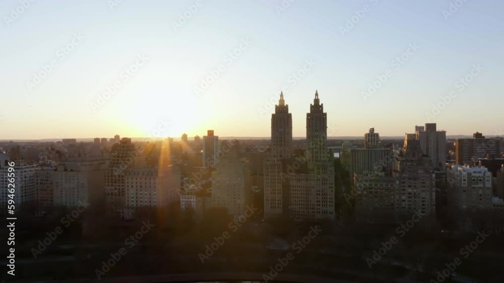 Aerial view of the sun behind the Upper East Side skyline in Manhattan, New York Aerial view of the sun behind the Upper East Side skyline in Manhattan, New York