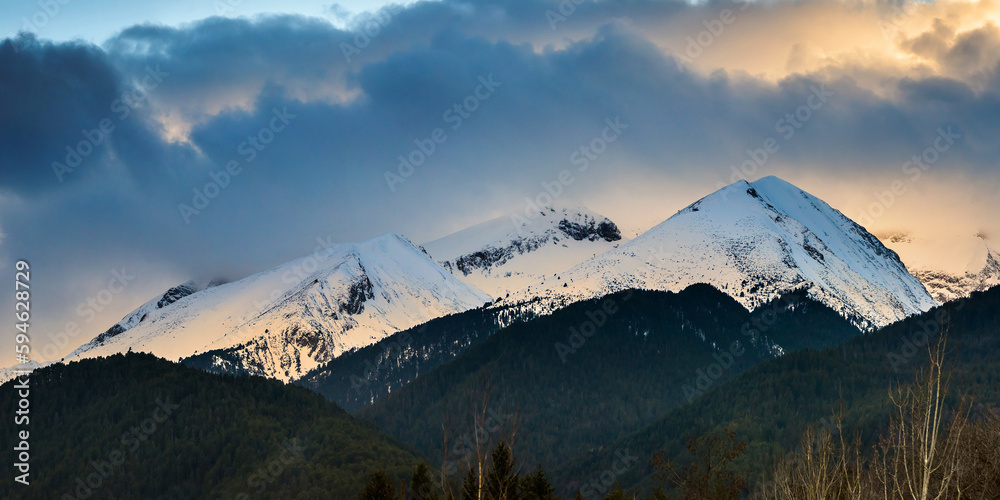 Pirin mountains at sunset, view from Bansko town. Winter landscape.