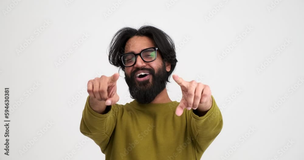 Portrait of ecstatic bearded young man screaming and gesturing excitedly while looking at camera isolated against white background Portrait of ecstatic bearded young man screaming and gesturing excitedly while looking at camera isolated against white background