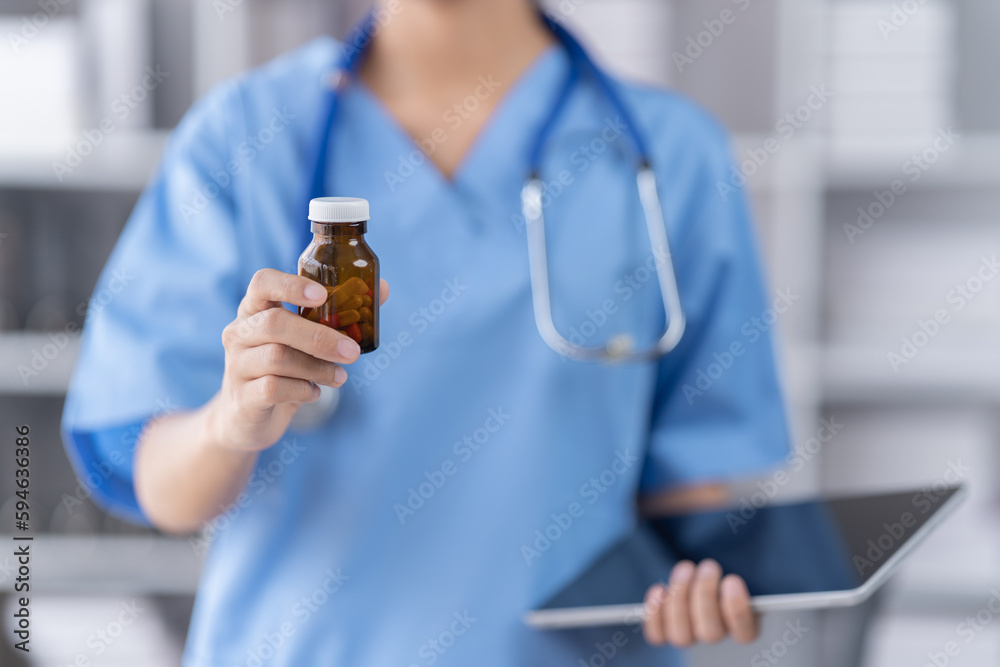 Medical concept of Asian beautiful female, doctor in blue coat with stethoscope, waist up. Medical student. Woman hospital worker looking at camera and smiling, studio, Medical concept of Asian beautiful female, doctor in blue coat with stethoscope, waist up. Medical student. Woman hospital worker looking at camera and smiling, studio,
