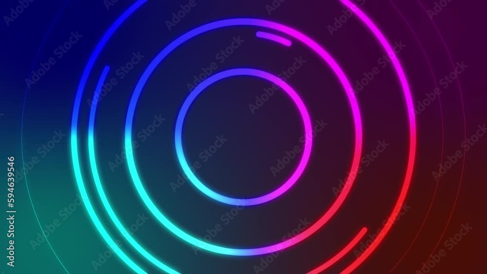 Colored neon circles on a black background. Dynamic video. Colored neon circles on a black background. Dynamic video.