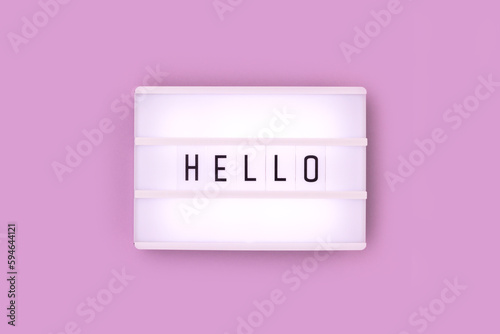 Принти на полотні Word Hello. White lightbox with letters on a purple background.