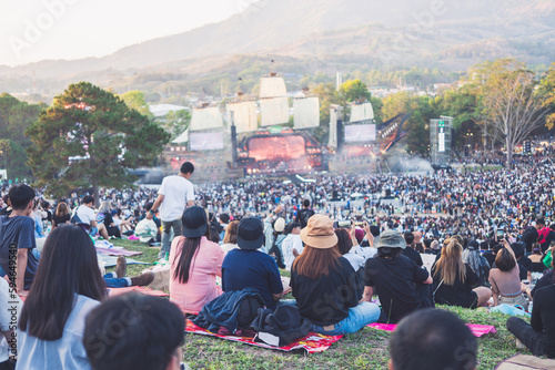 people watching concert in the park at open air,Summer festival concert.