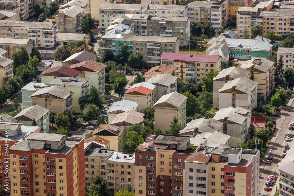 the view of a city from above of the buildings on the road