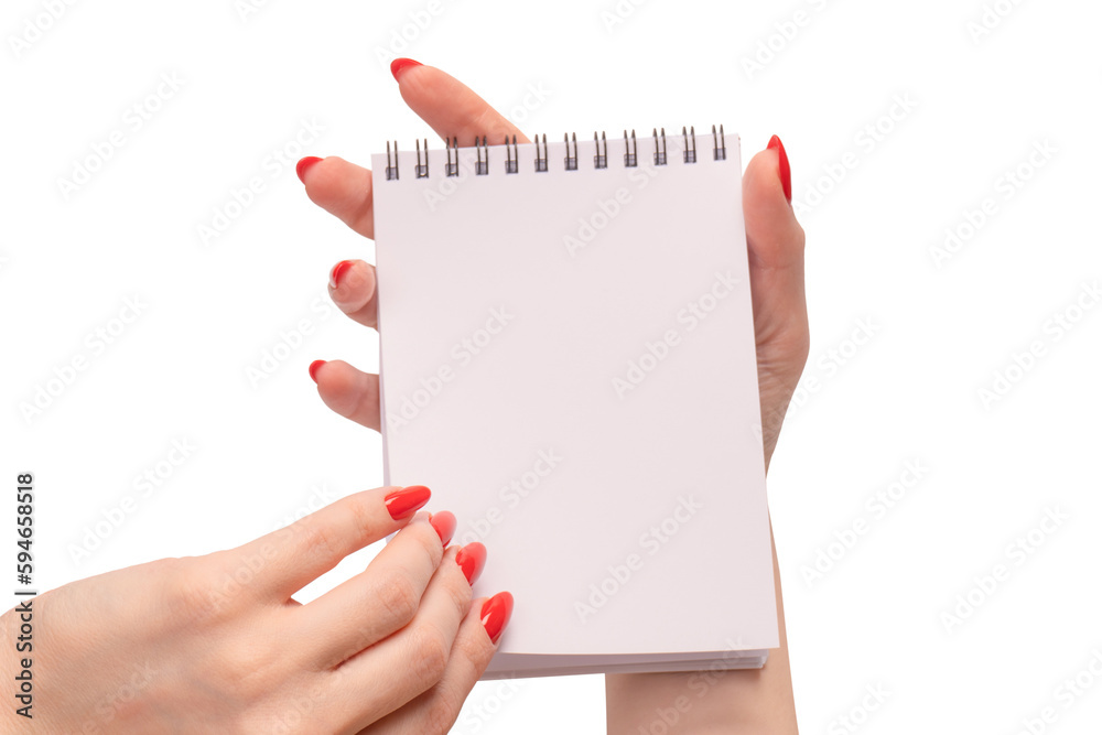 A notebook with empty white paper in woman hands with red nails. A notebook with empty white paper in woman hands with red nails.